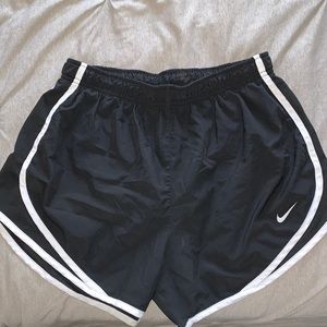 Black Nike running shorts